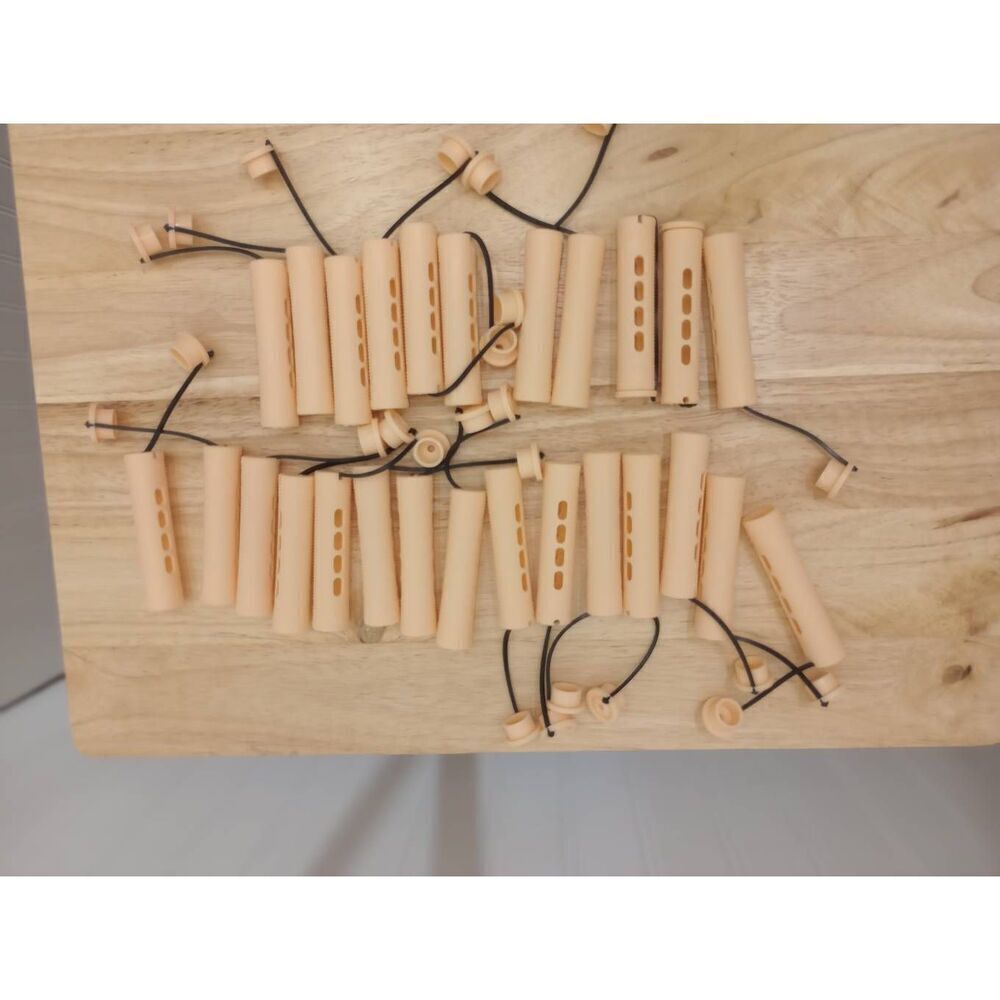 Set of 26, peach colored perm rods  used once